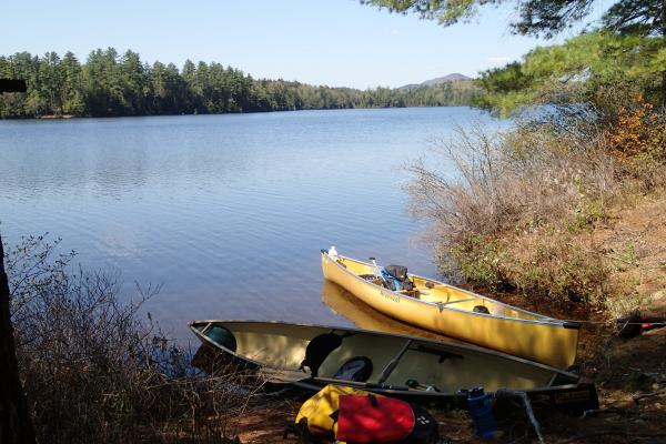 two canoes sitting a canoe landing on Little Long Pond